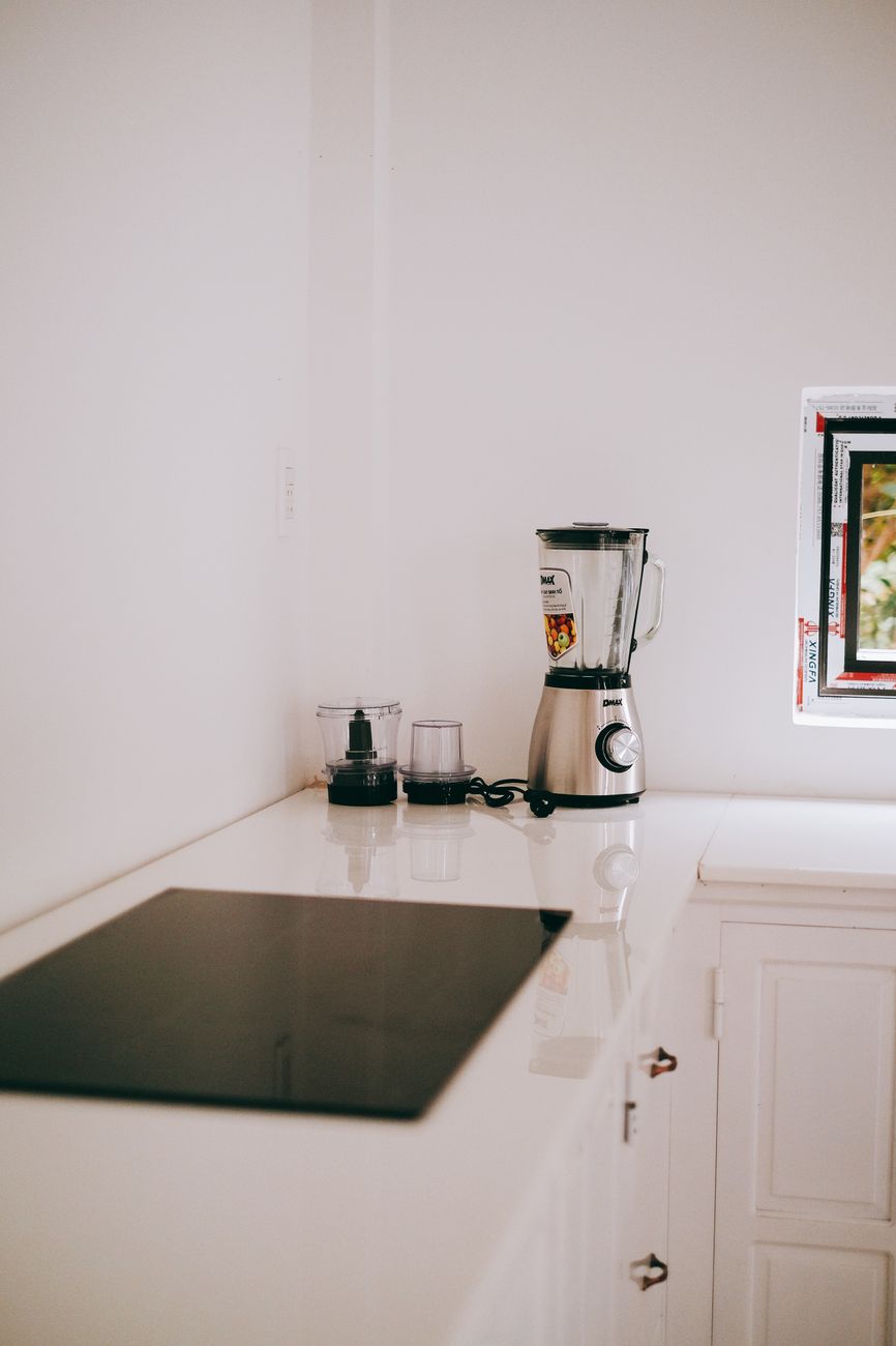 blenders on top of a kitchen counter